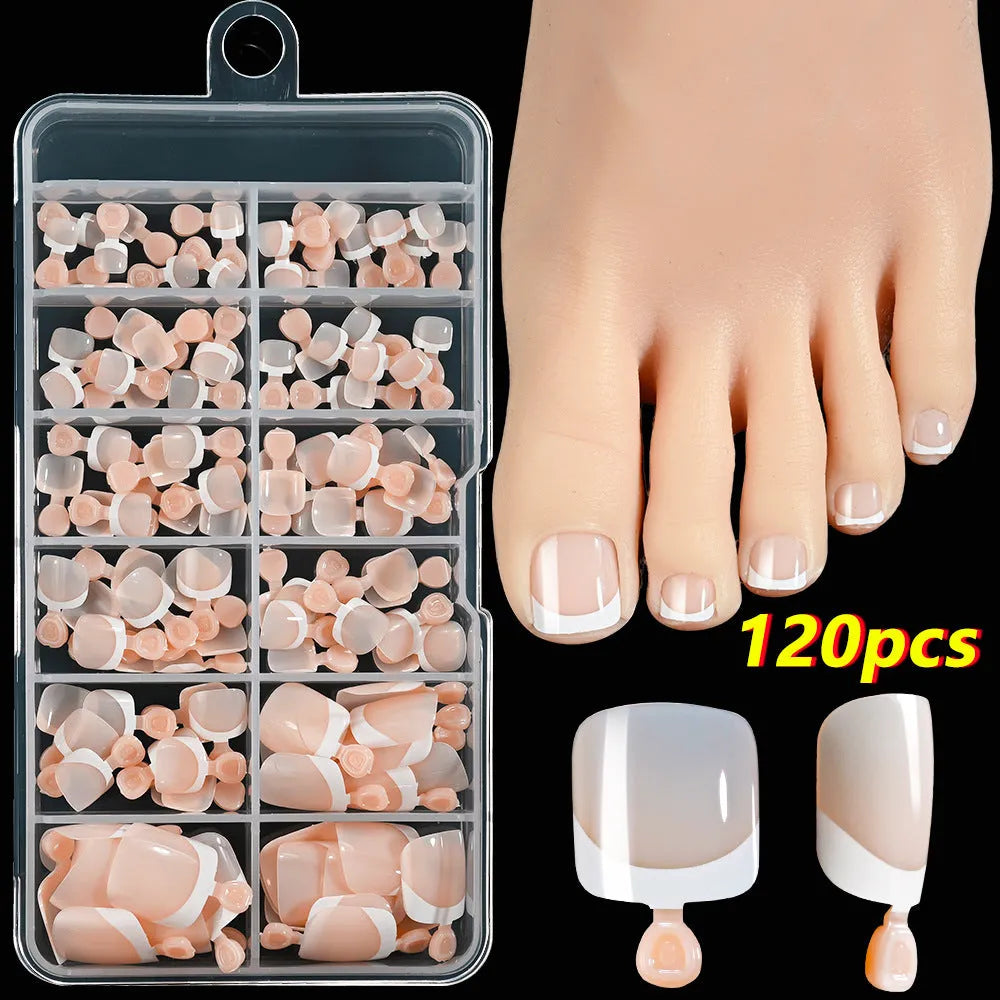 Box of 120 French white edge full square short nude toe nail tips on a white background.