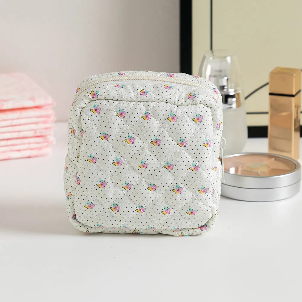Floral polyester key storage bag with sewing thread detailing in multiple colour patterns