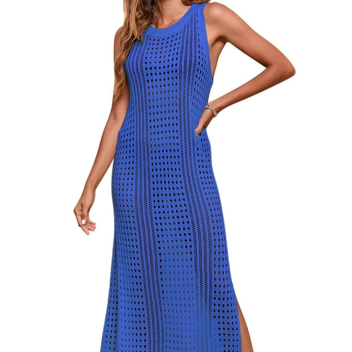 Long loose beach blouse in cotton blend fabric with hollow-out knitted design on a female model.