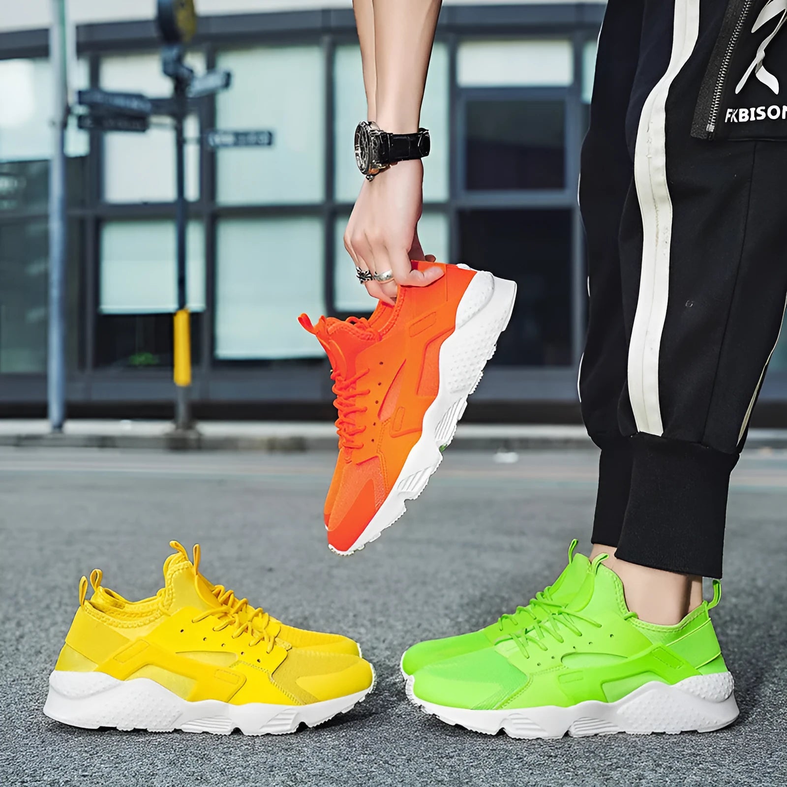 Men's fluorescent casual sneakers with mesh upper, cross shoulder straps and flat sole.