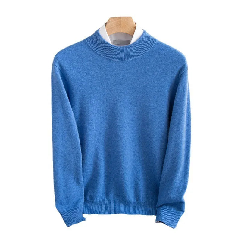Man wearing a loose-fit half-collar wool sweater in a textured knit, shown in one of the available colours like camel or dark grey.