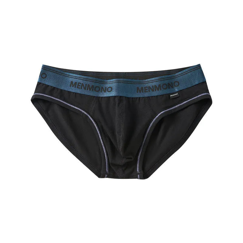 Men's low waist cotton briefs in a selection of solid colours including black and blue, white and red.
