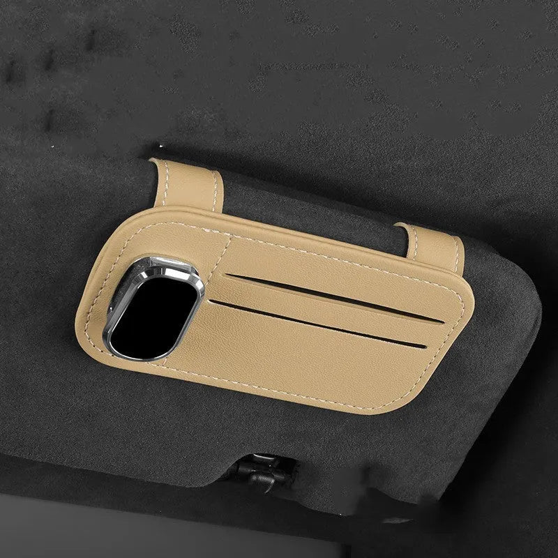 Cowhide leather card holder clipped onto a car sun visor in a choice of colours.