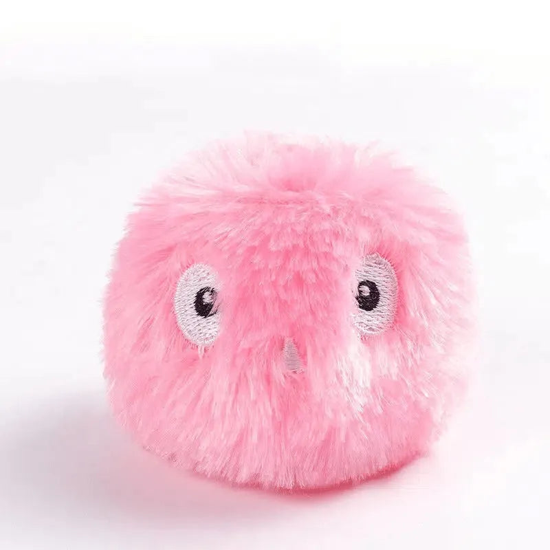 Interactive cat toy ball in blue, pink, and yellow colours with 55mm diameter for animal sound stimulation