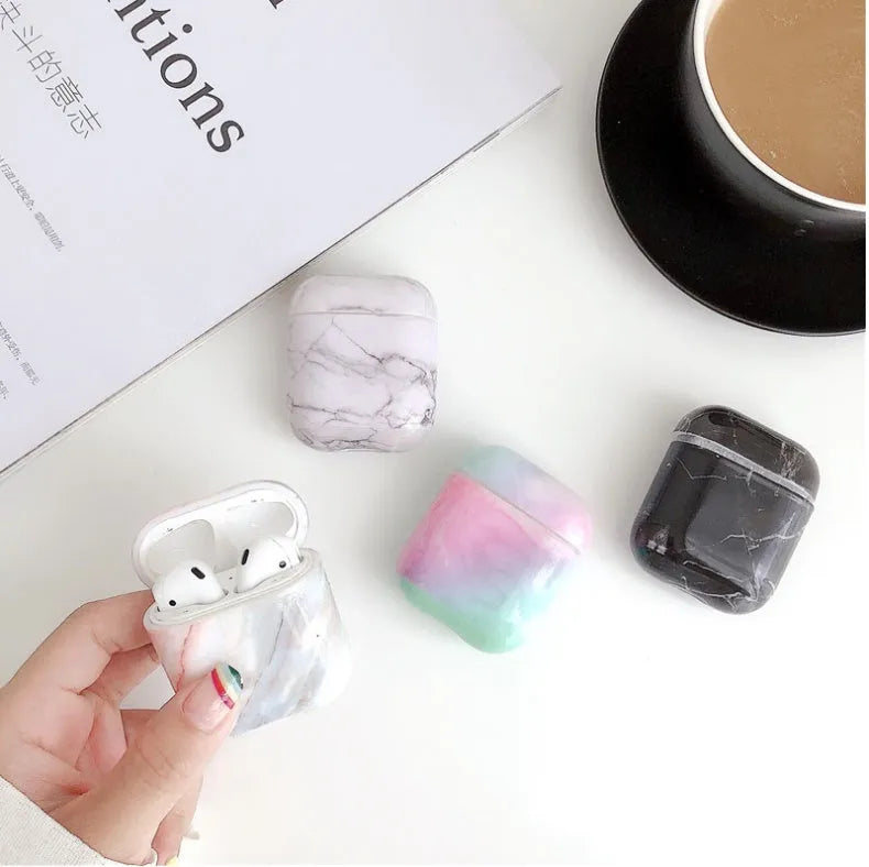 White marble pattern hard protective case for AirPods 1 and AirPods 2 wireless charging box.