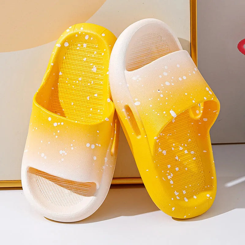 Gradient coloured PVC summer slippers for children on a non-slip sole.