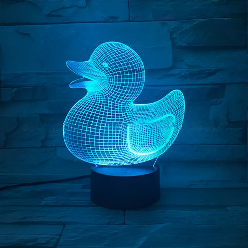 Little Yellow Duck 3D night light with acrylic panel on ABS base, showing remote control and USB cable.