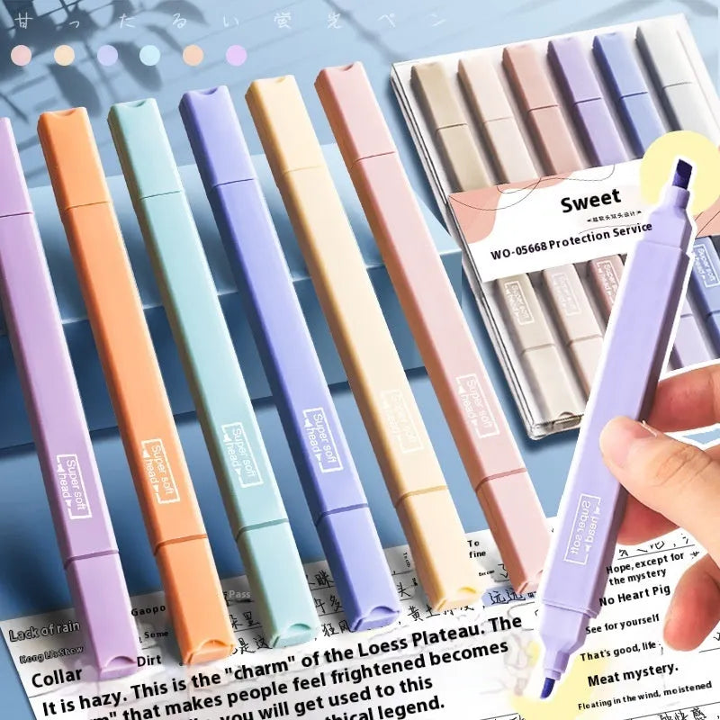 Set of double tipped fluorescent marker pens in assorted colours for highlighting and writing.
