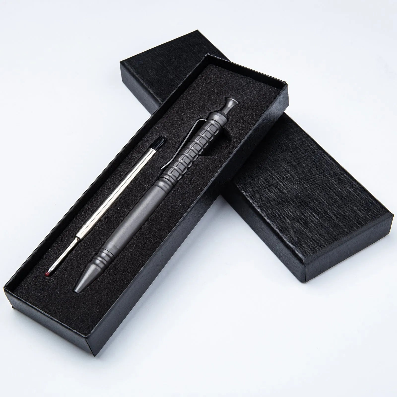 Titanium alloy tactical pen with push-action mechanism in gunmetal grey and 0.5mm nib