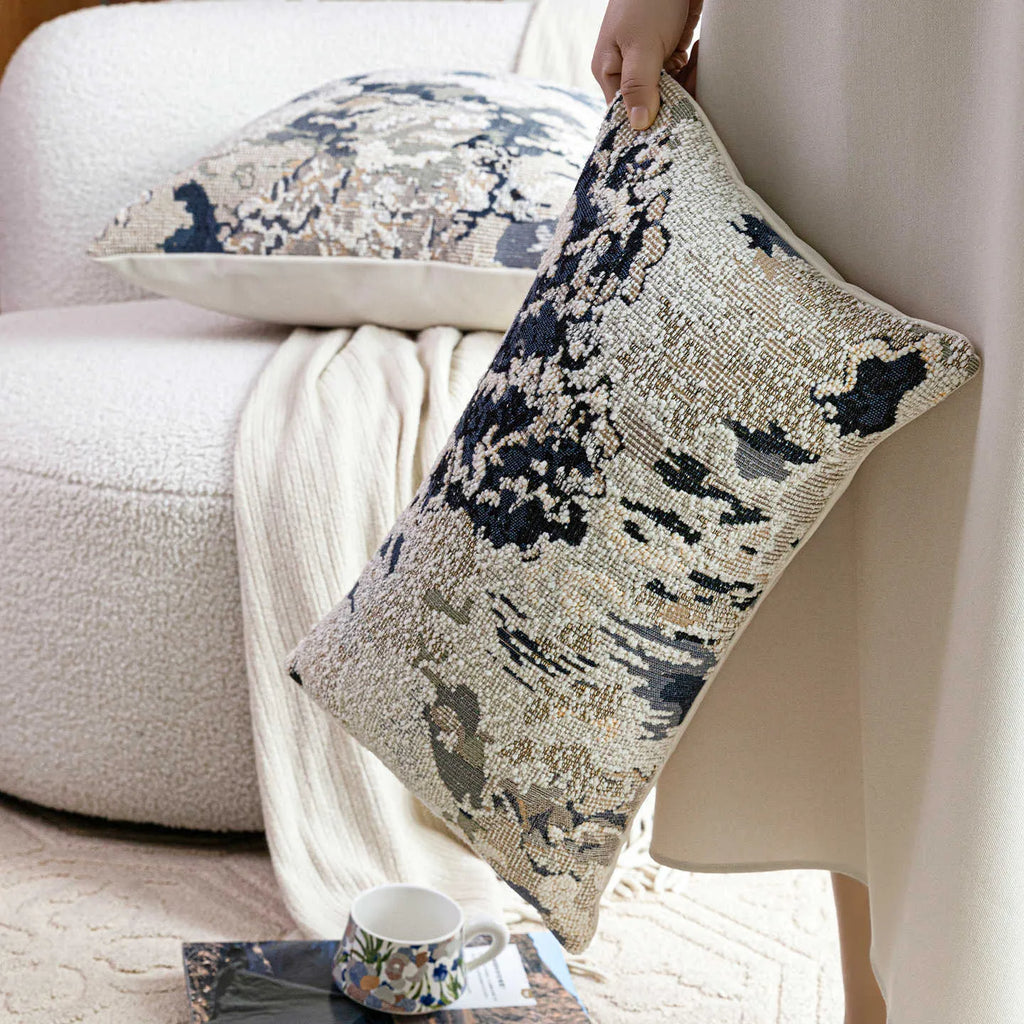 Antique blue decorative cushion with abstract floral artistic pattern on wool blend fabric, shown in square and rectangular sizes.