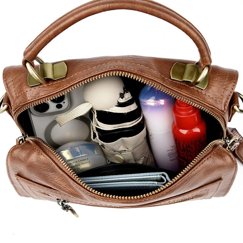 Soft grey PU women's crossbody bag with a square shape and an external sandwich pocket.
