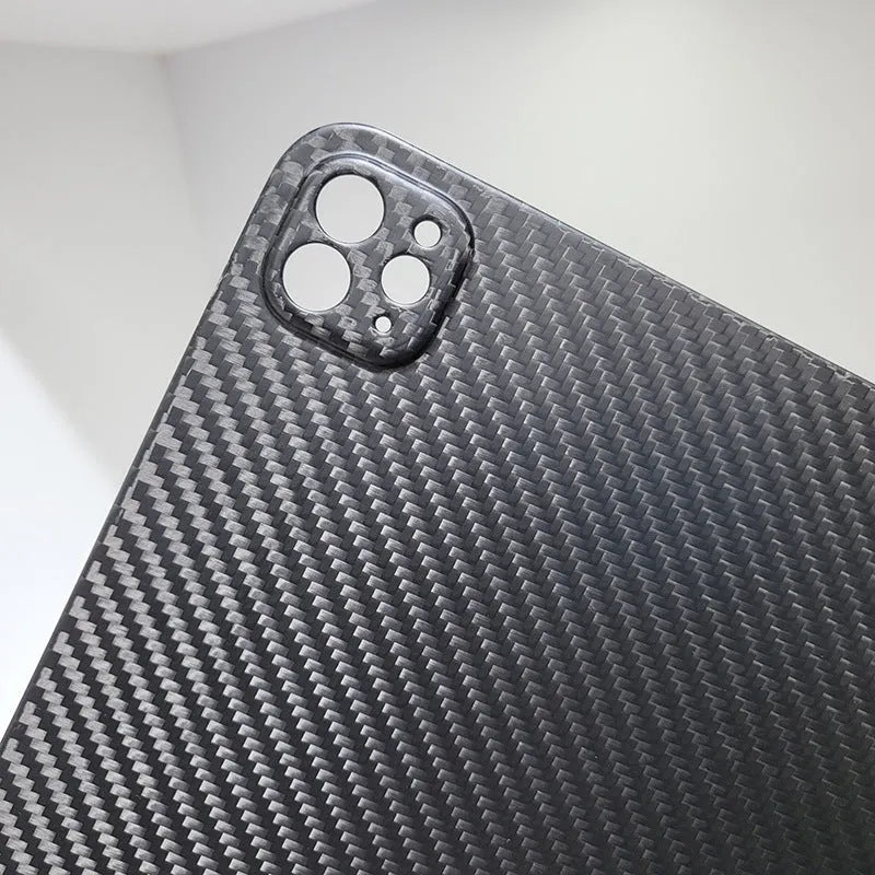 Carbon fibre hard protective case for Apple iPad Pro 11 showing embossed plaid pattern and choice of surface finishes.