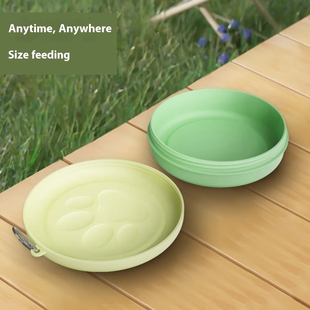 Portable collapsible dog bowl with attached snack box in light pink and light green colour options