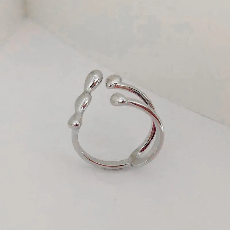 Adjustable brass opening ring with sphere design in gold colour for women