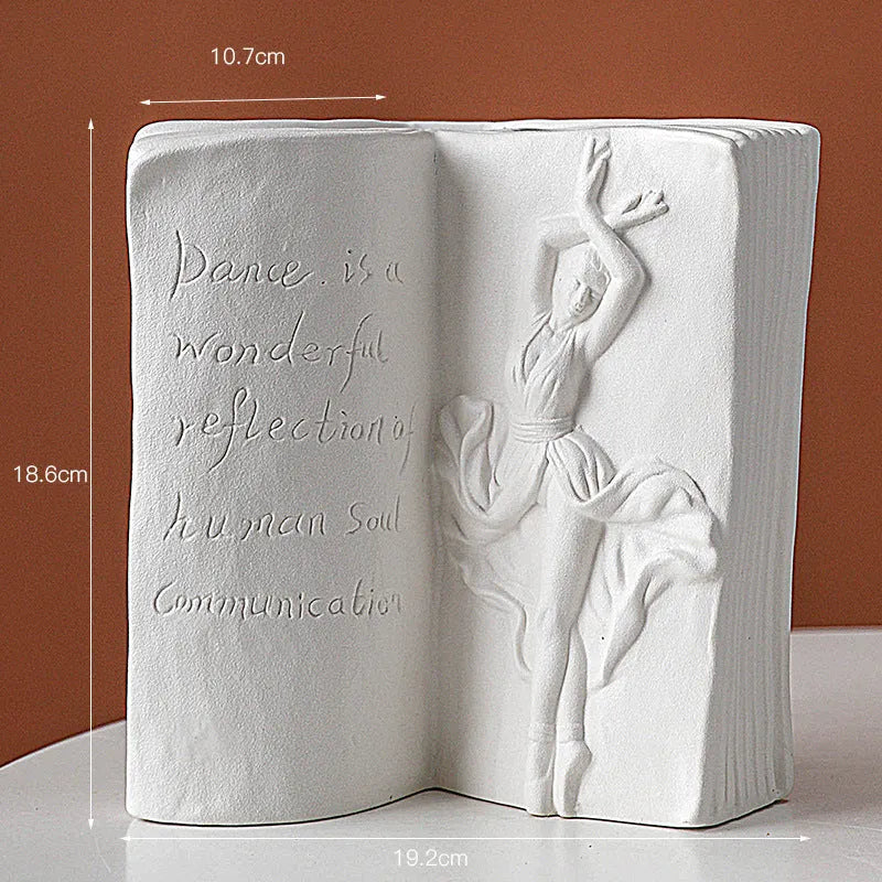 Ceramic book stand with glazed finish in one of four artistic designs on a desk.