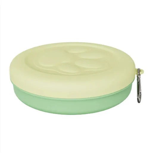 Portable collapsible dog bowl with attached snack box in light pink and light green colour options