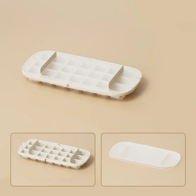 Colourful ice cube tray with grid design and integrated ice shovel storage compartment