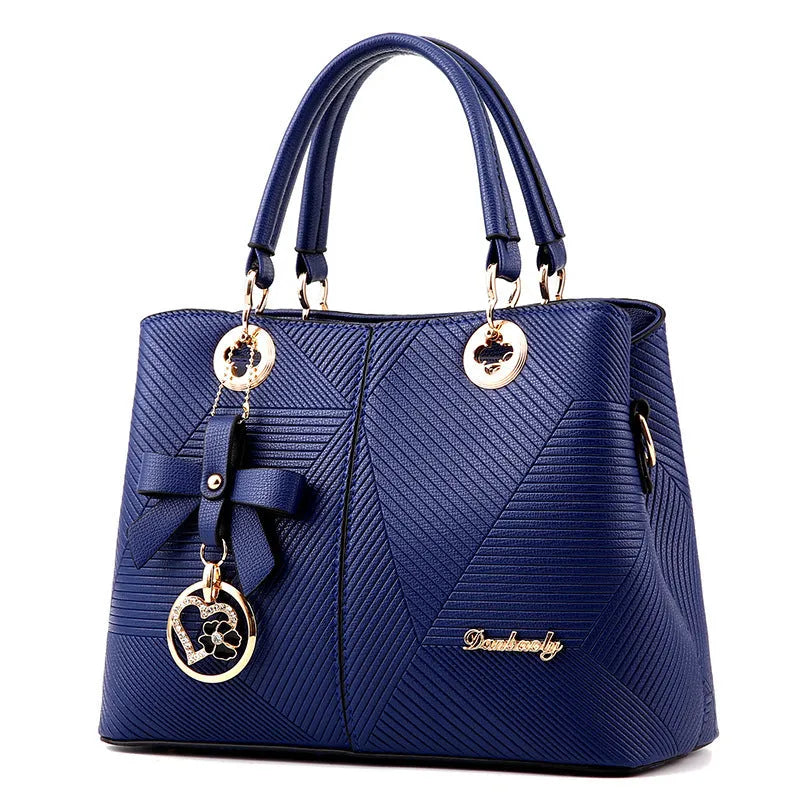 Retro-style PU leather handbag with zipper and one-shoulder strap in multiple colours.
