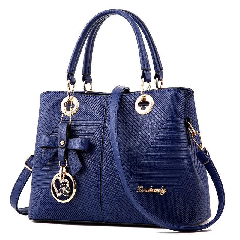Retro-style PU leather handbag with zipper and one-shoulder strap in multiple colours.