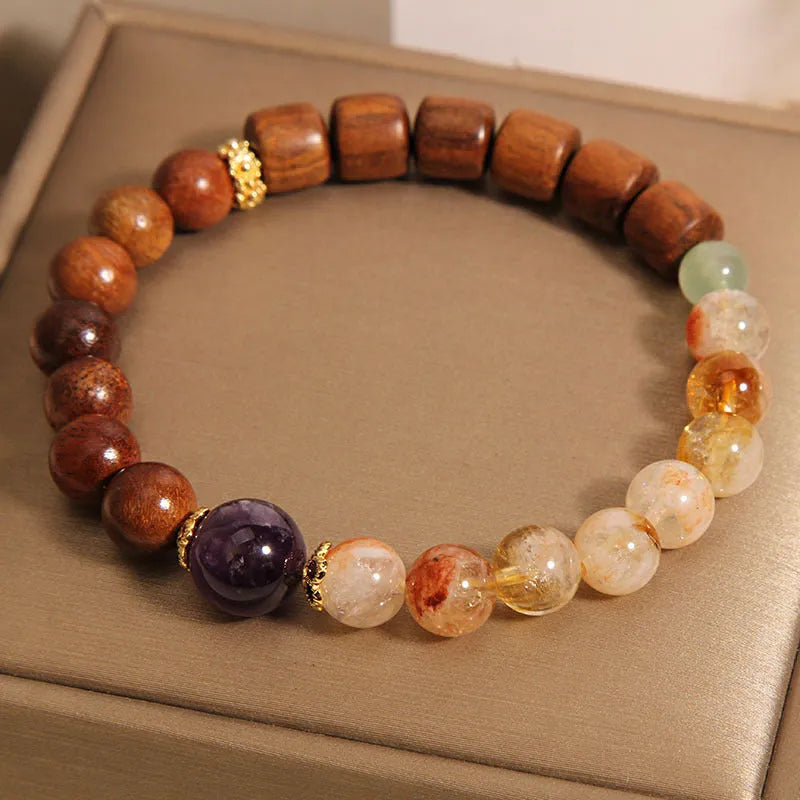 Women's yellow tower crystal and ebony amethyst bracelet with pearl and rhinestone decoration
