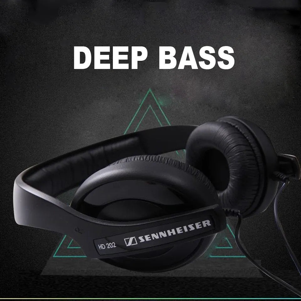 Black over-ear headphones with a headband, large ear cups, a long cable, and a 3.5mm plug.
