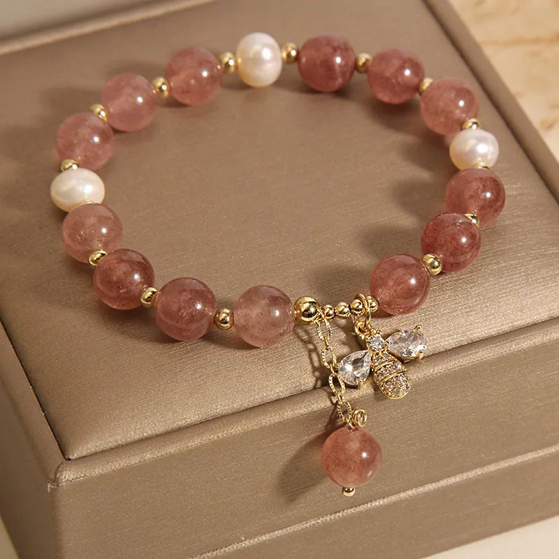 Freshwater pearl and strawberry quartz bracelet with zircon flower charms