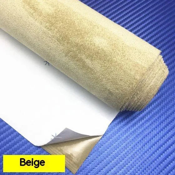 Sheet of self-adhesive elastic suede in beige colour, showing its thickness and adhesive backing.
