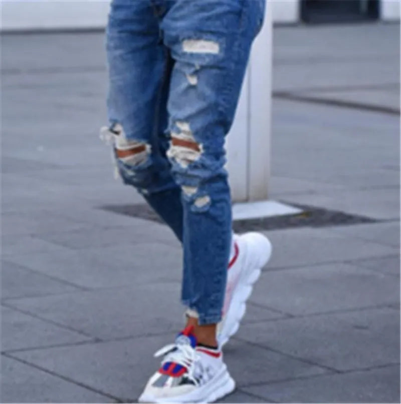 Deep blue cotton men's jeans laid flat, available in sizes S to 3XL.