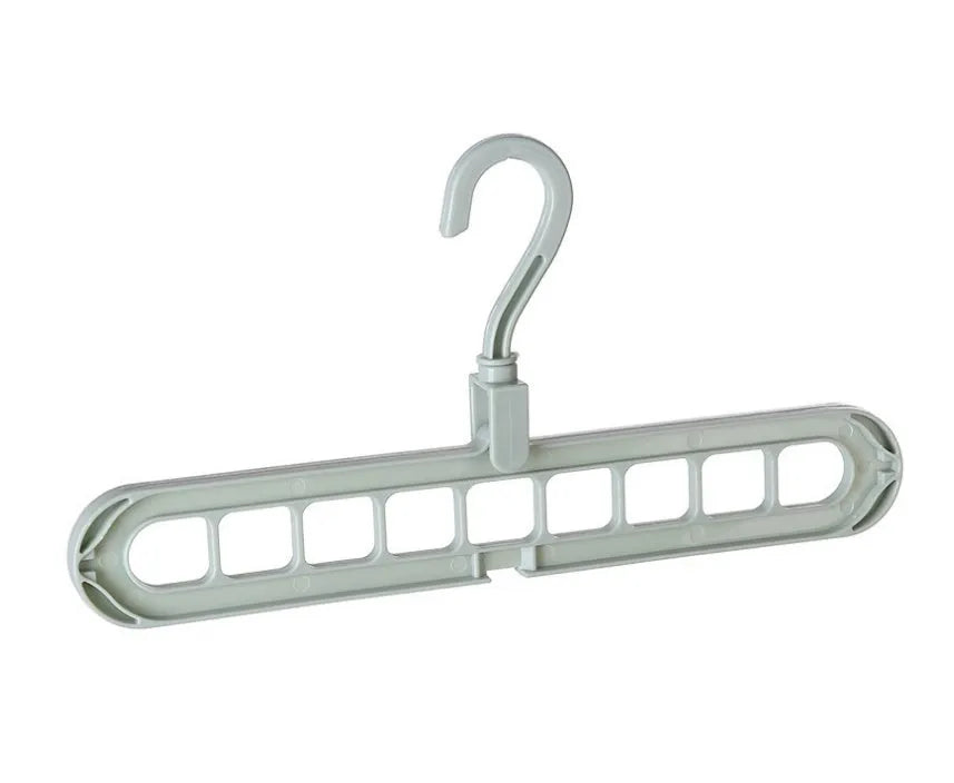 Plastic clothes hanger with rotating hook in assorted colours on white background