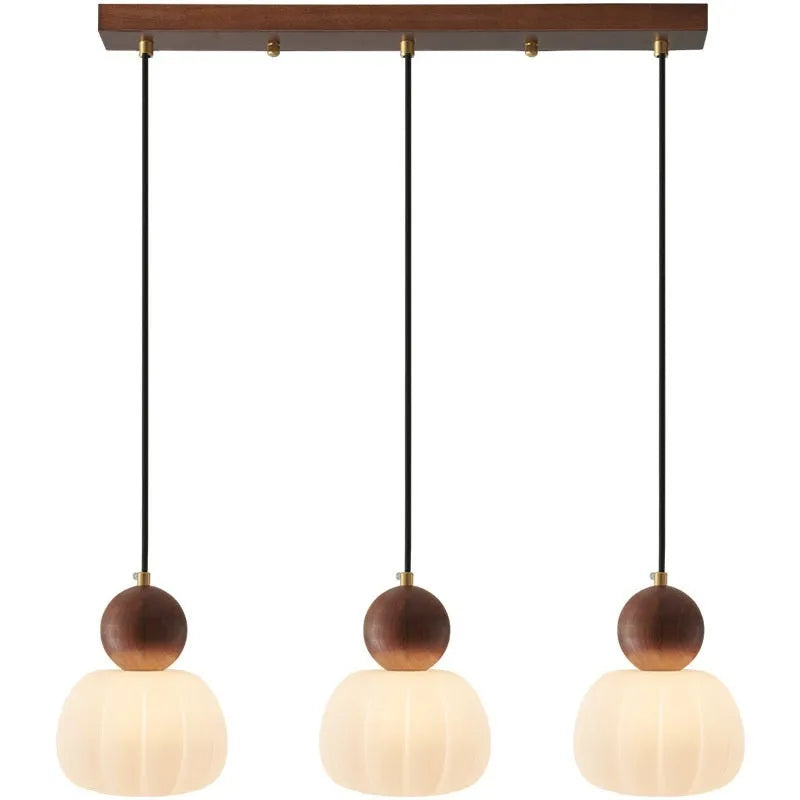 Nordic style pumpkin-shaped alloy chandelier for ceiling mounting in a bedroom or dining room.
