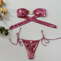 Glossy sapphire blue tube top split bikini for women with starfish pattern, showing backless design.