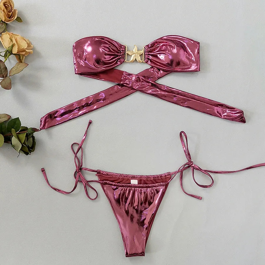 Glossy sapphire blue tube top split bikini for women with starfish pattern, showing backless design.