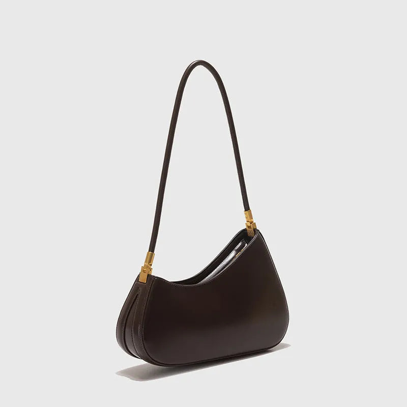 Retro oval women's underarm handbag in multiple colours, showing sandwich pocket design and single shoulder strap.