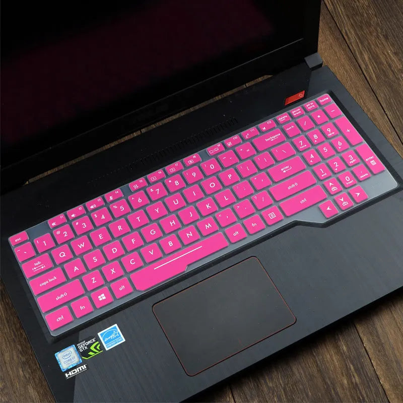 Transparent silicone keyboard protective film for ASUS Flight laptop on a keyboard.