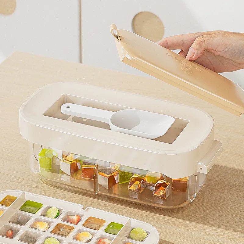 Colourful ice cube tray with grid design and integrated ice shovel storage compartment