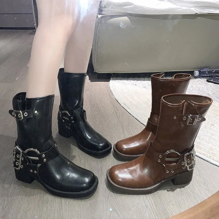 Women's black platform boots with mid-calf sock design and ankle buckle strap