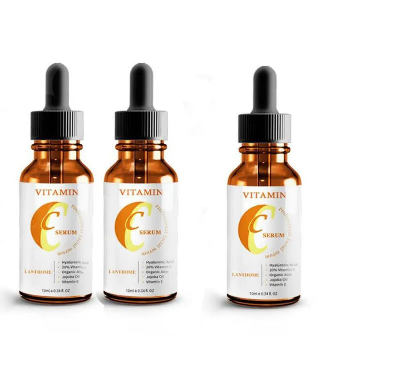 Bottle of Vitamin C and Hyaluronic Acid facial serum for anti-aging and skin brightening.