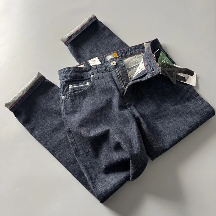 Men's straight leg jeans in American retro style with primary colour wash and mid waist design
