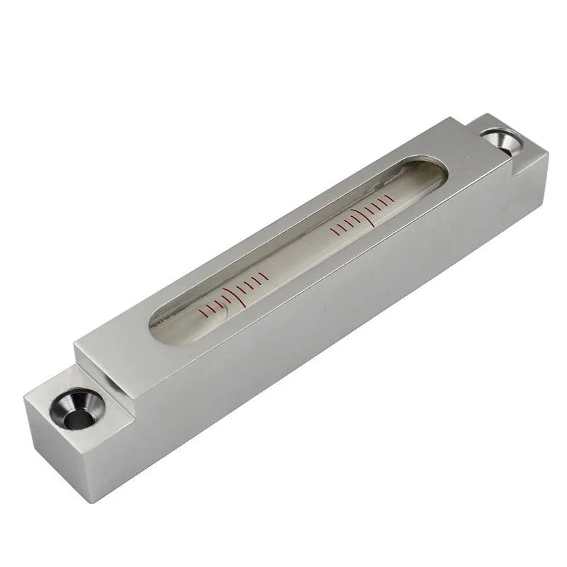 Mini metal and glass strip spirit level showing 132mm length with clear vial containing 500 blisters