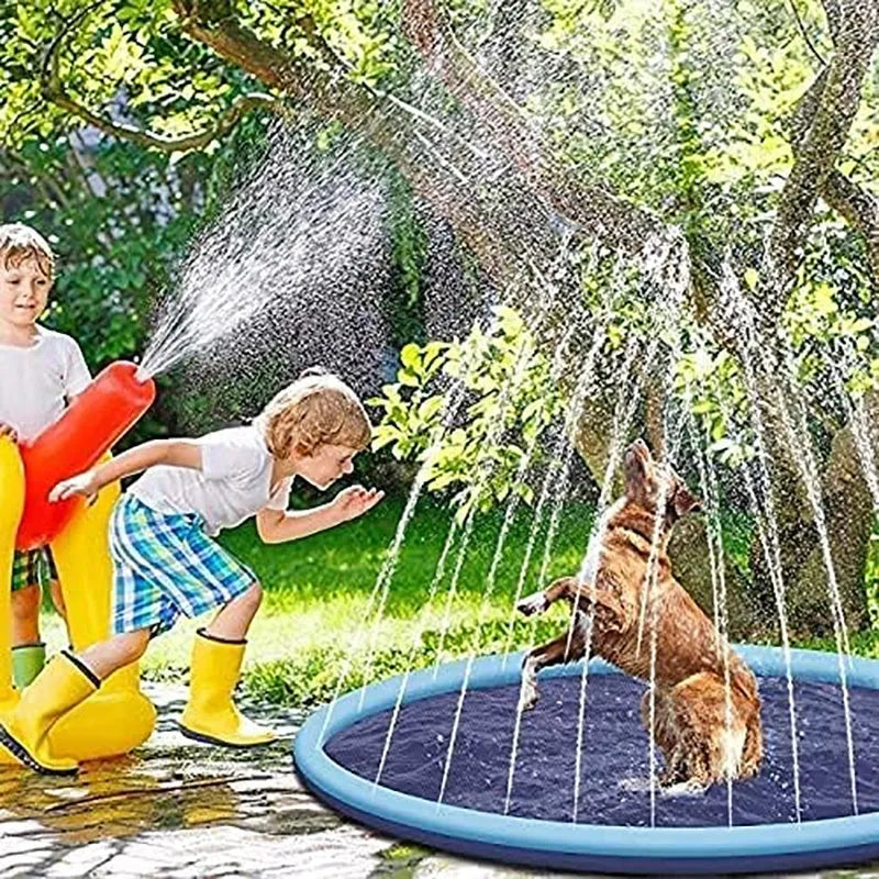 Large blue and green dog splash pad with sprinkler spray, showing anti-slip texture, placed on grass.