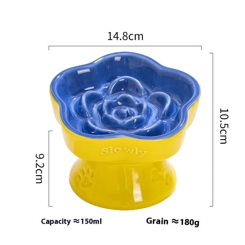 A white ceramic pet bowl with a high foot and raised neck protector to prevent tipping.
