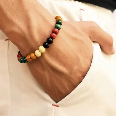 Natural lava stone beaded bracelet for essential oils, ethnic style, on a white background.