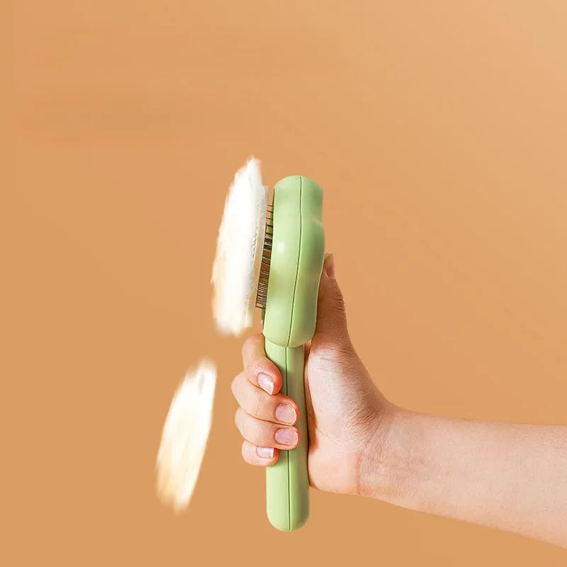 Self-cleaning cat comb magic wand with stainless steel needle teeth in green or yellow colour options