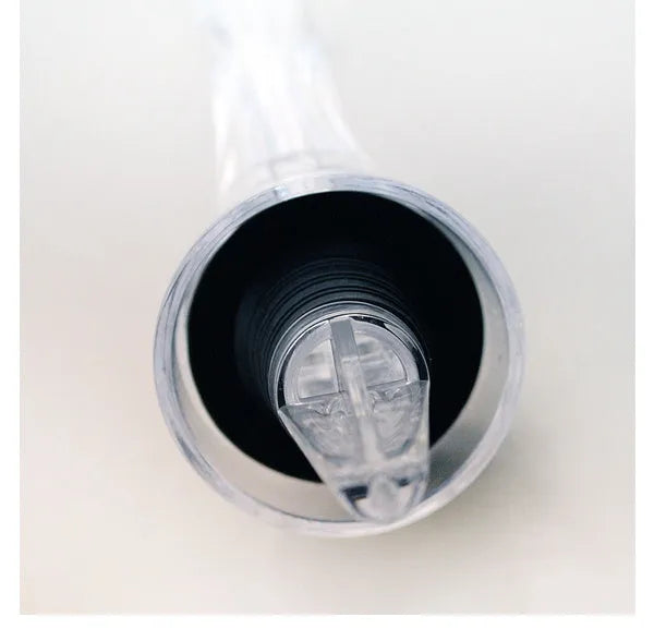 Compact transparent wine aerator with stainless steel filter measuring 16 by 4.2 centimetres
