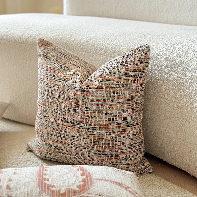 American-style jacquard sofa cushion cover with woven paisley and flower pattern in amber colours.