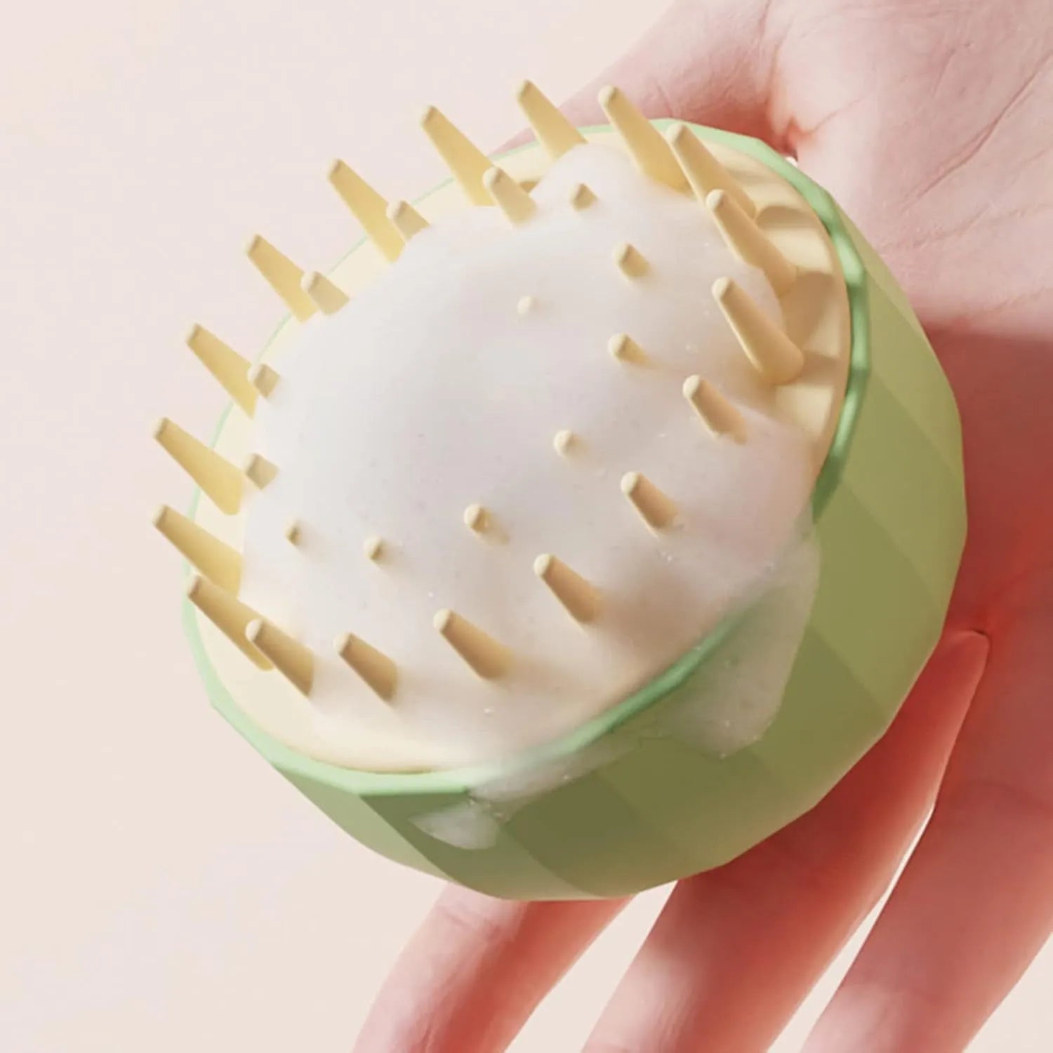 Green double-sided dog bath massage brush with drain holes for shampoo and hair removal
