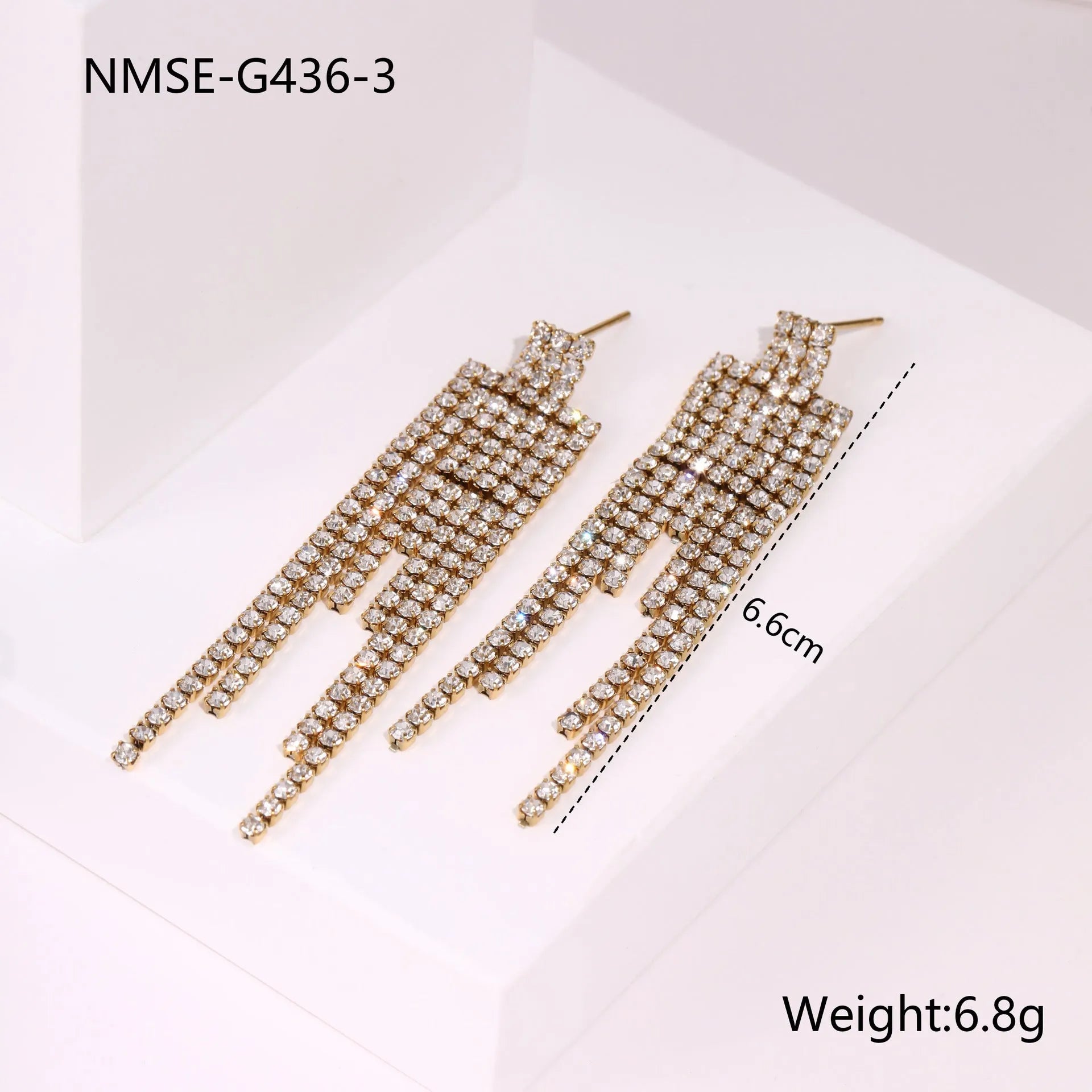 Stainless steel heart-shaped earrings with geometric star detailing and 18K gold electroplated finish