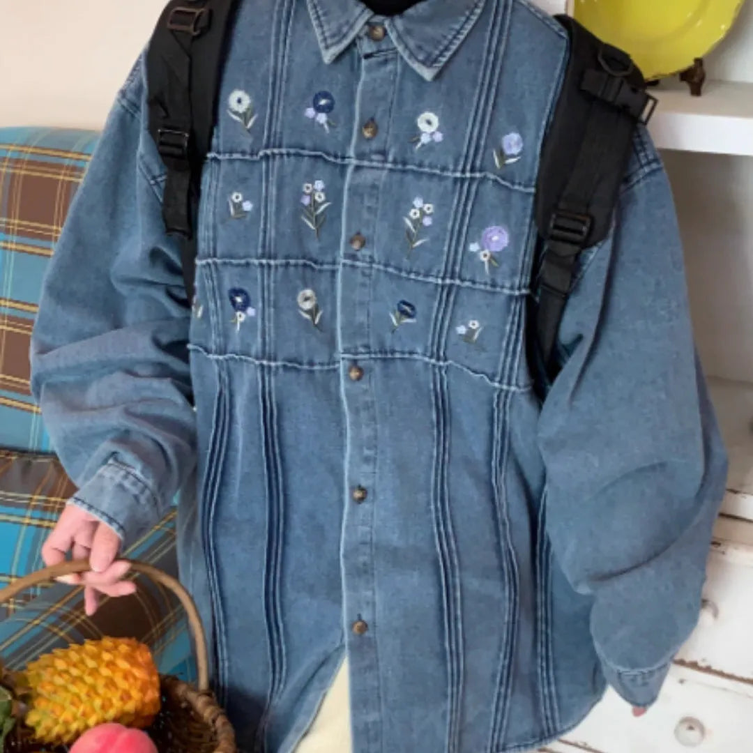 Vintage small floral pleated washed denim long sleeved blue shirt on hanger