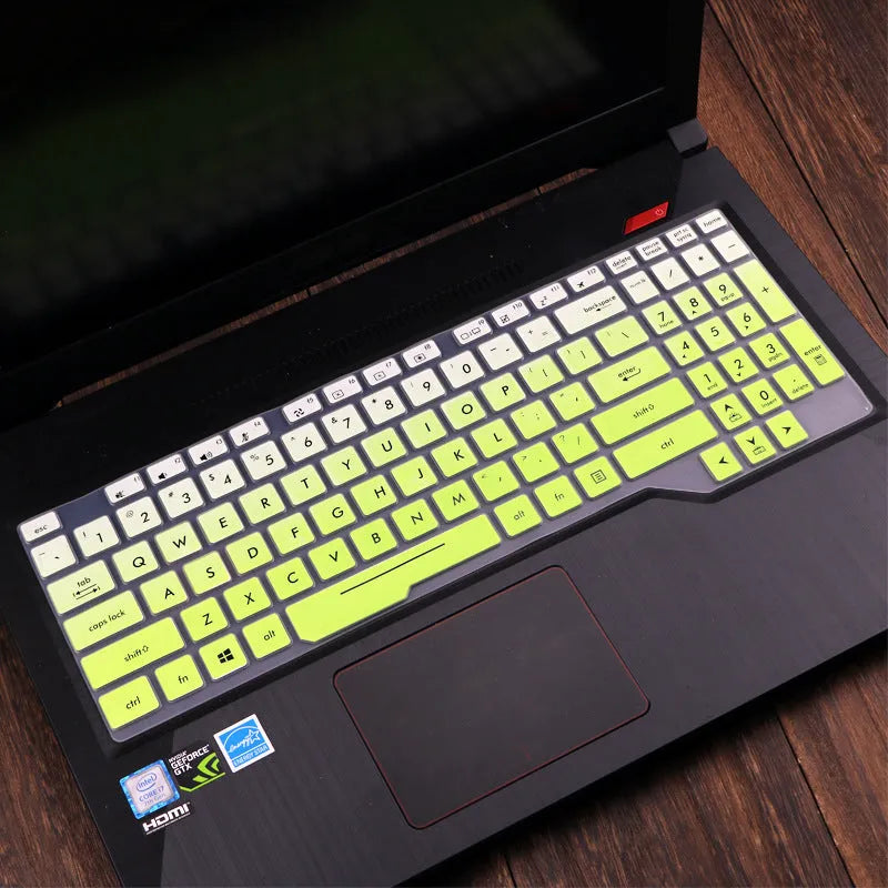 Transparent silicone keyboard protective film for ASUS Flight laptop on a keyboard.