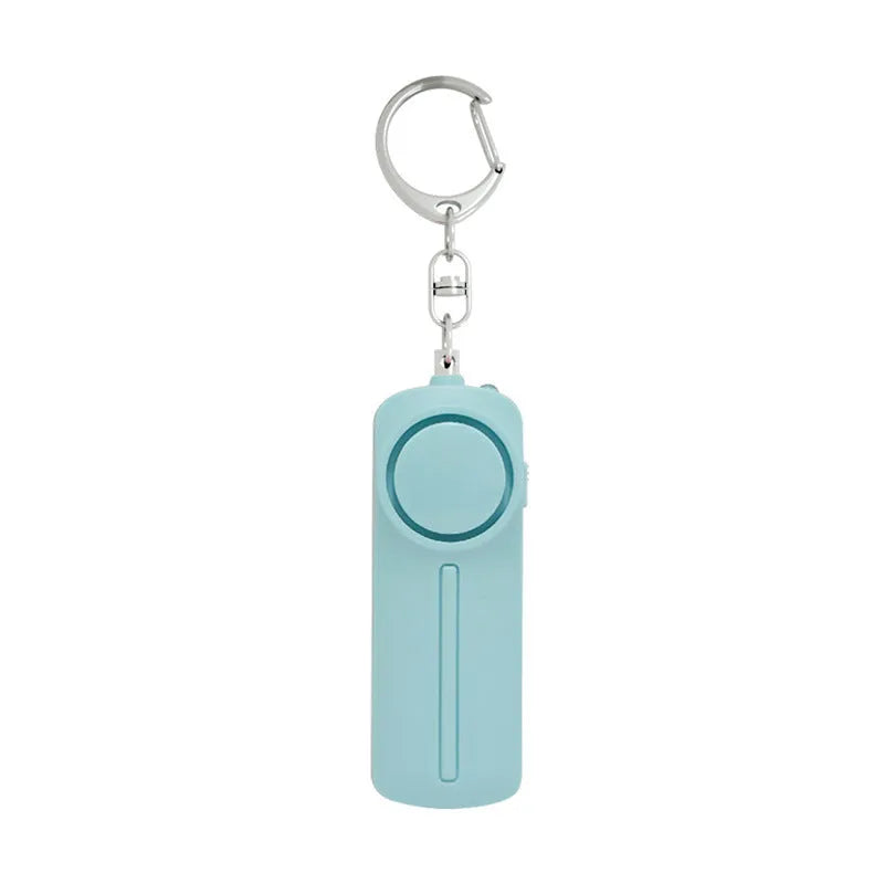 Personal safety alarm device measuring 86×30×20 mm with 130 dB sound output in pink colour option